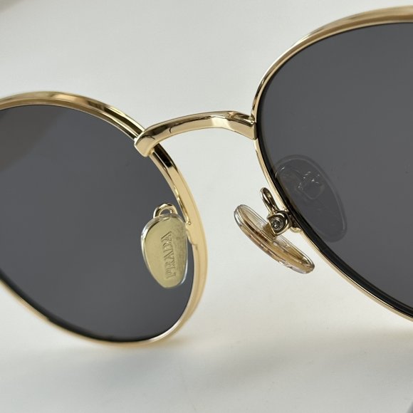 Prada - Солнцезащитные очки K2_2207PR10