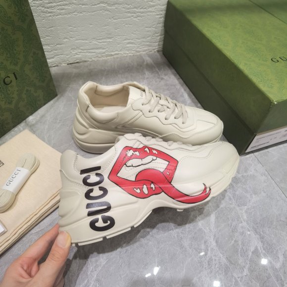 Gucci Rhyton Женские кроссовки MO_1409GU1W