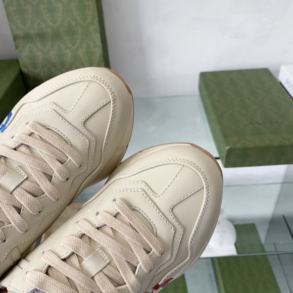 Gucci Rhyton Женские кроссовки MO_1509GU1W