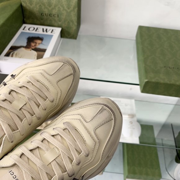 Gucci Rhyton Женские кроссовки MO_1509GU1W
